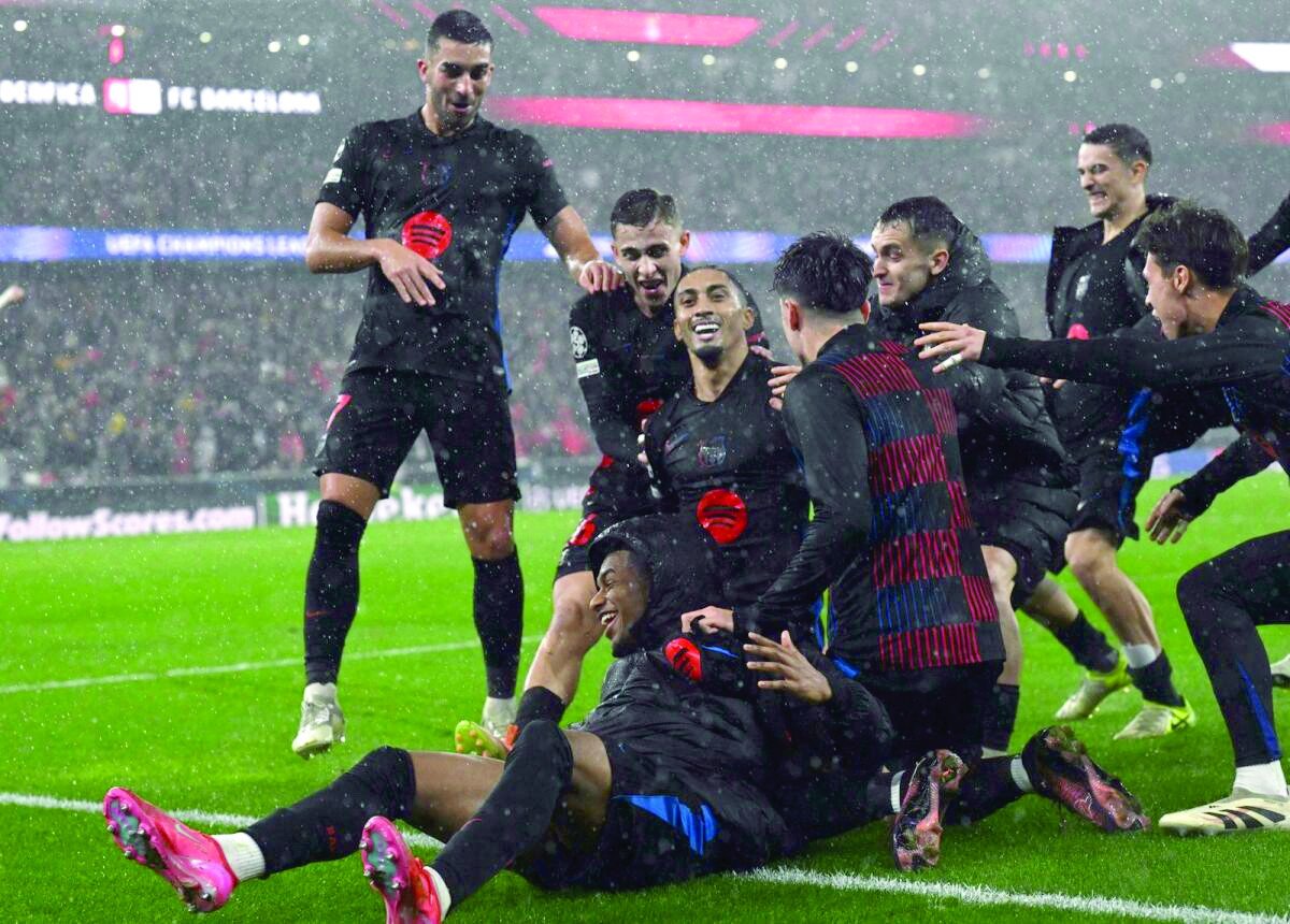 Barca triumph over wild Benfica in UCL | The Express Tribune