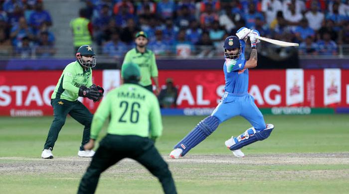 Kohli silences 'the noise' with record-breaking century against Pakistan