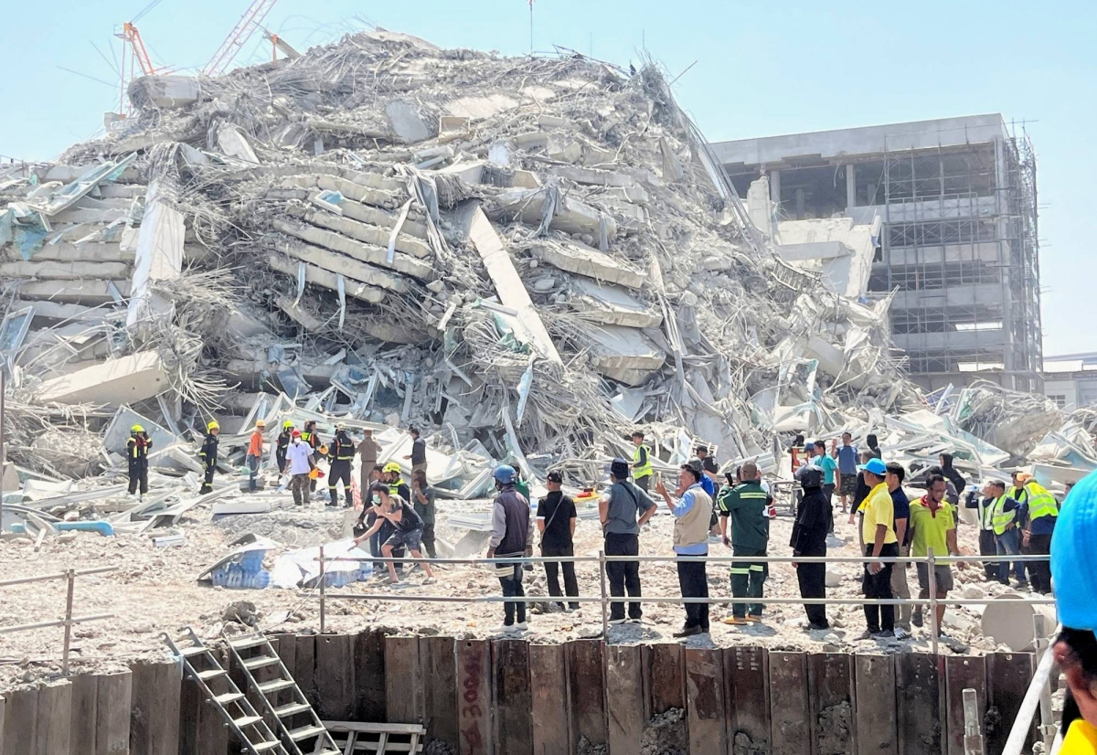 Panic on the streets of Bangkok as skyscraper collapses in quake