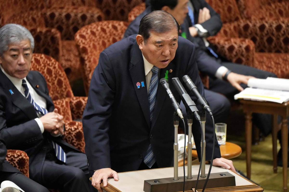 Tokyo insists defense issues and tariff talks must remain separate