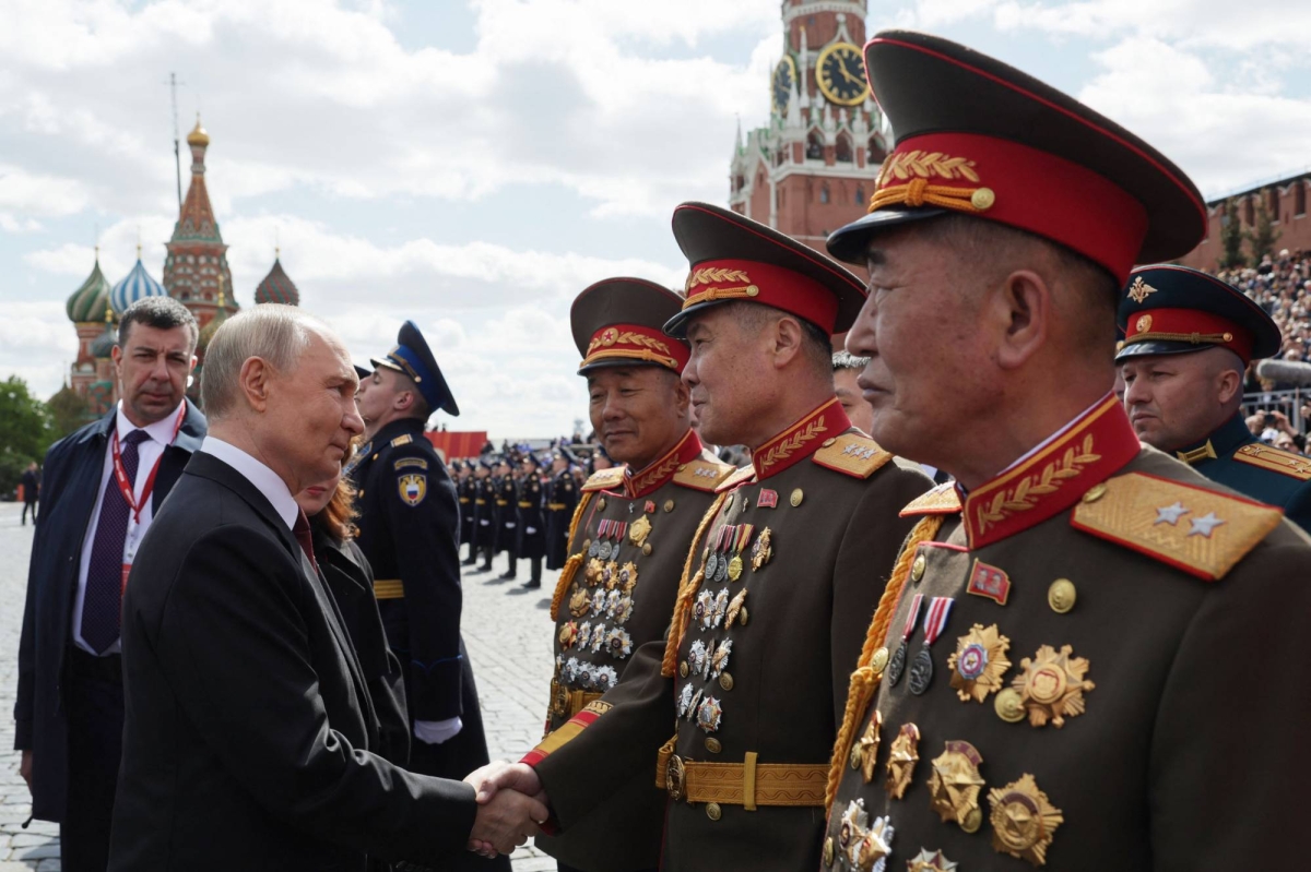 Putin hails troops in Ukraine as allies attend WWII parade