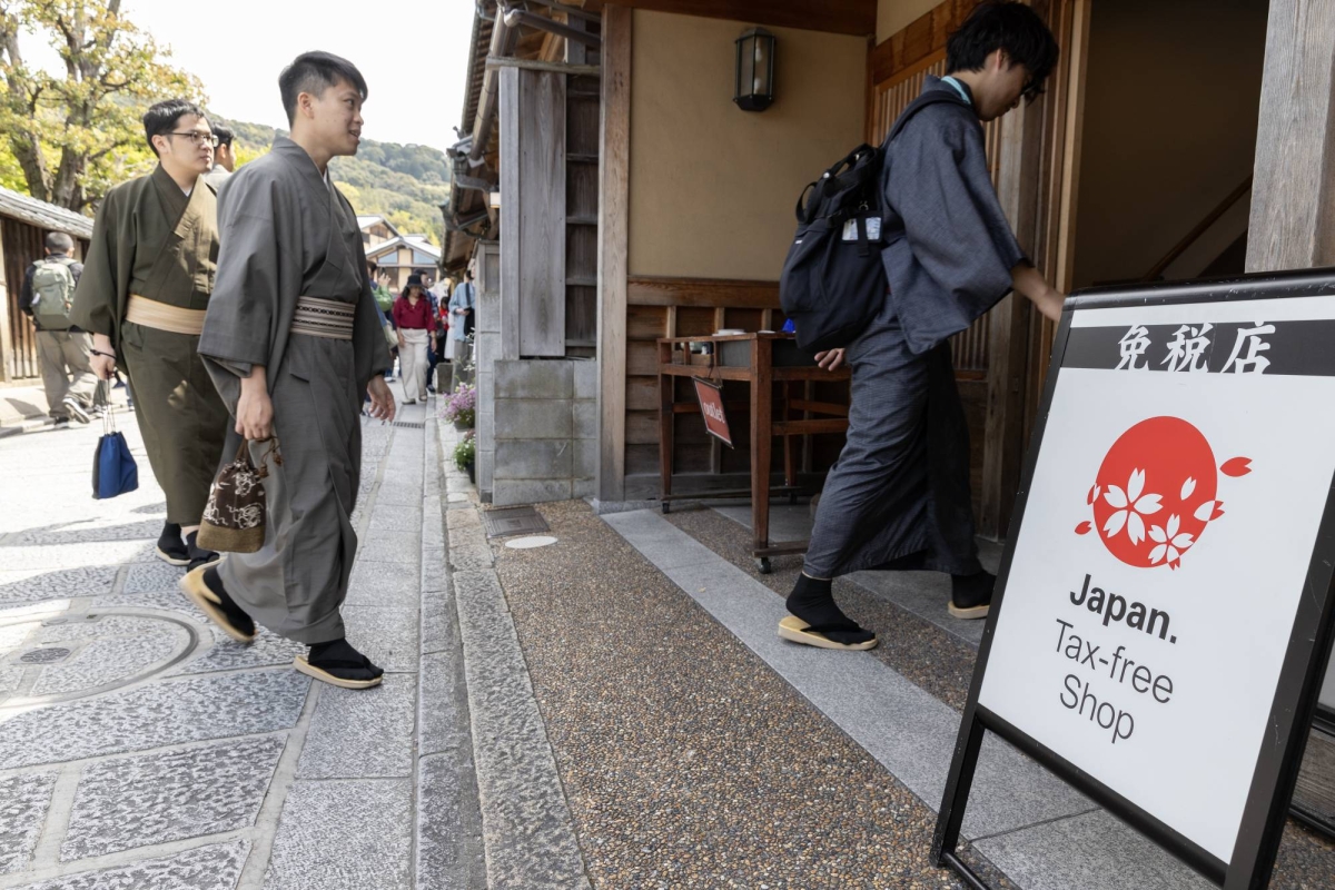 Japan eyes tougher rules for foreign residents and tax hike for tourists
