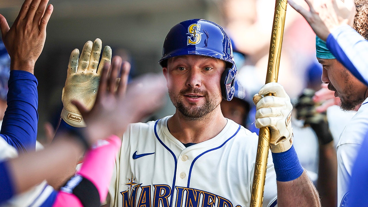 Cal Raleigh becomes 1st catcher in MLB history to hit 49 home runs in ...