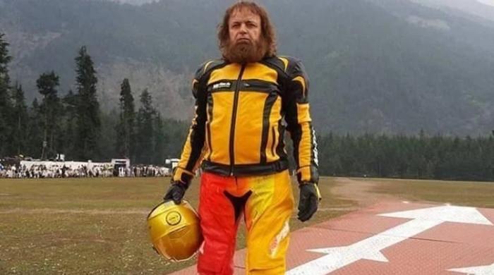 Pakistan's Sultan Golden sets world records for fastest reverse drive, ramp jump