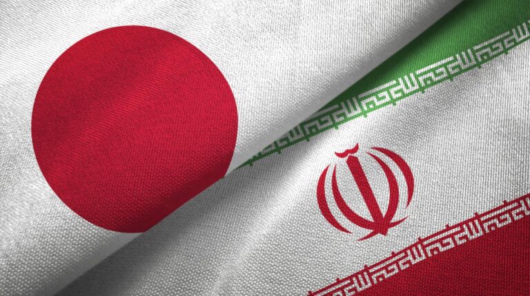 Iran and Japan two flags together realations textile cloth fabric texture