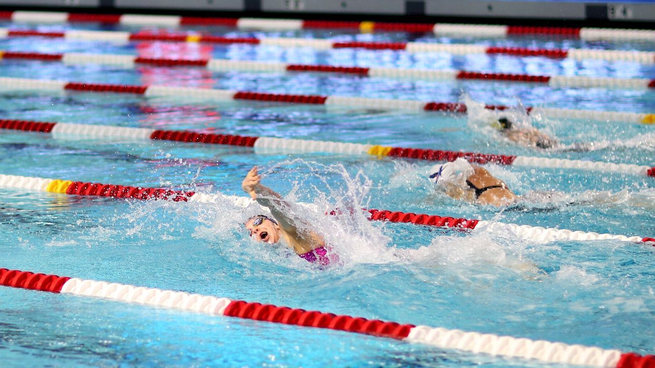 Virginia leads after 2 relay wins at NCAA swim championships
