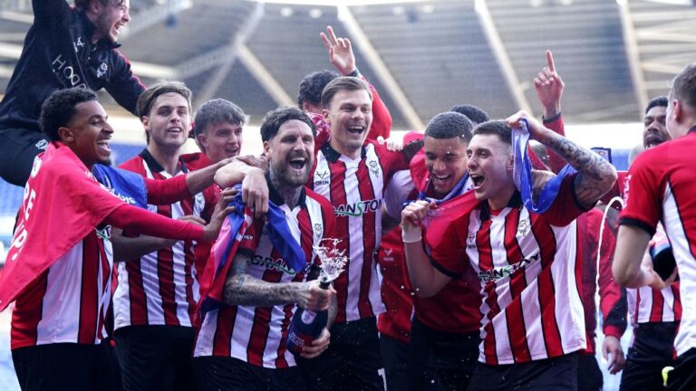 Lincoln City promoted to Championship after 65-year absence