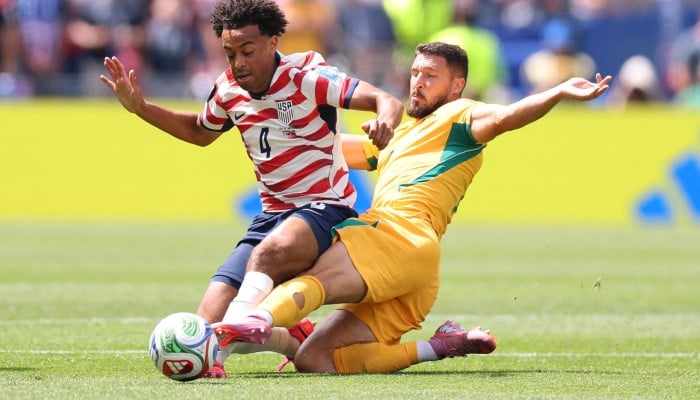 US advance to last 32 with comfortable victory over Australia