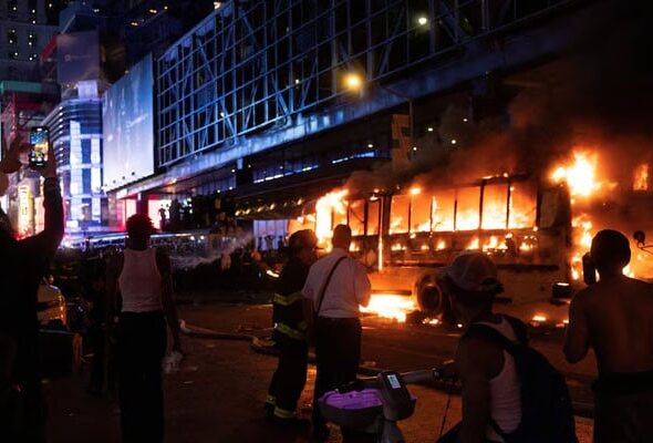 World Cup bus set alight as chaotic celebrations erupt in Manhattan after Knicks win