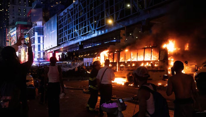 World Cup bus set alight as chaotic celebrations erupt in Manhattan after Knicks win